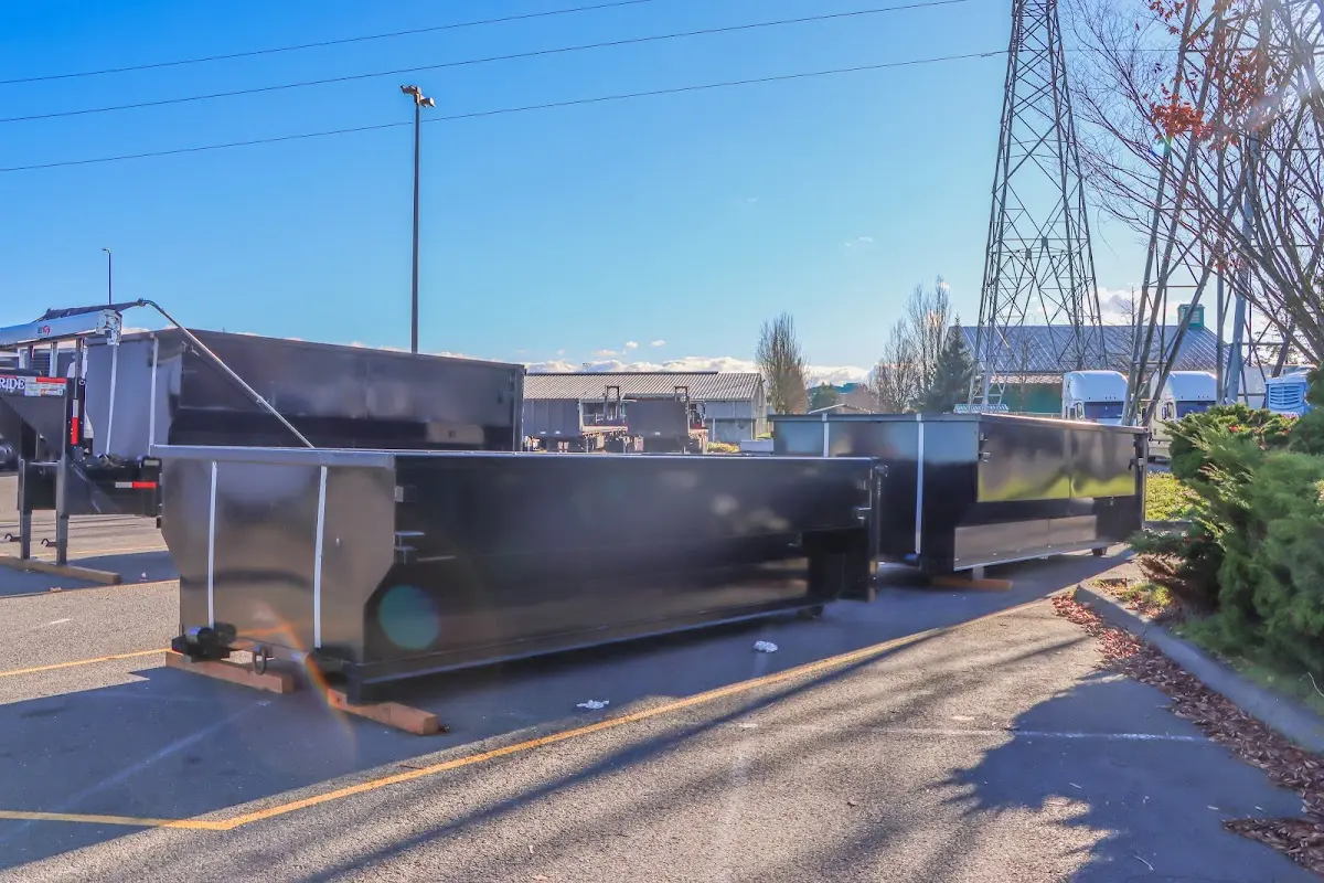 Roll-off dumpster ready for waste disposal at job site for Construction Dumpster Rental in Menominee
